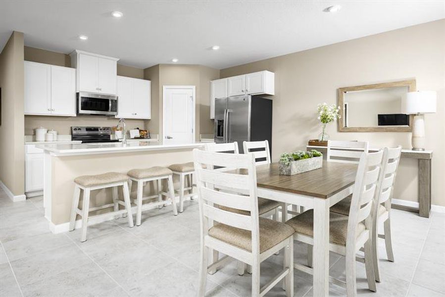 Representative furnished interior of a home built from the Palm by Ryan Homes in Terra Lago, Indiantown (Image 2).