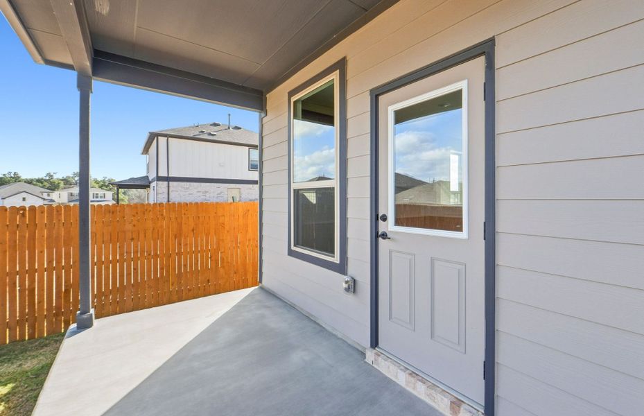 Exterior details and patio area of a home in Saddleback at Santa Rita Ranch, Liberty Hill (Image 23).