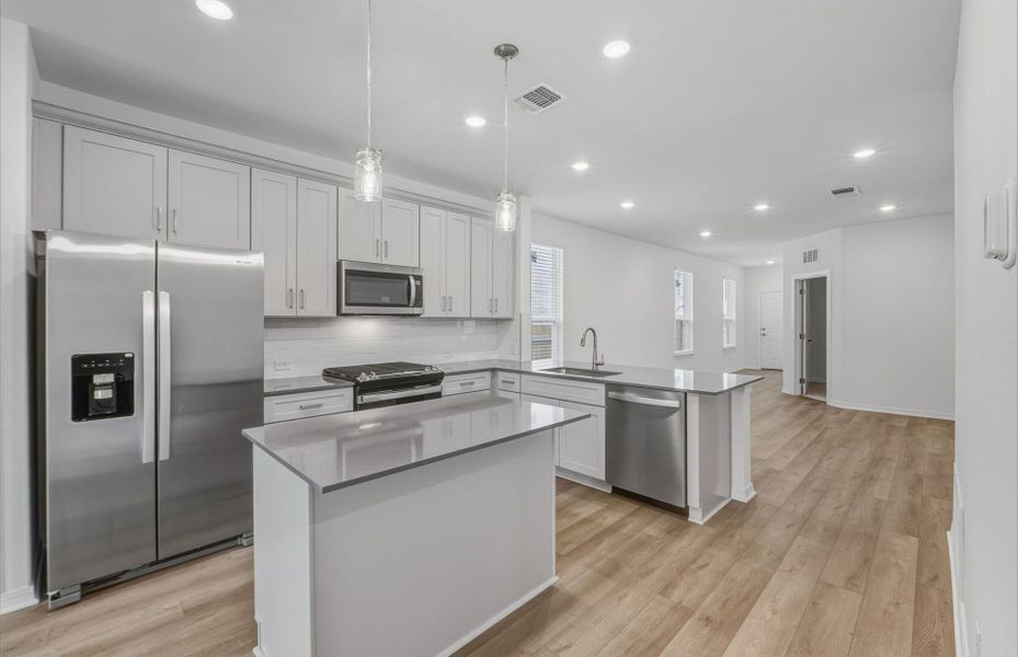 Furnished interior view inside a new home in Crosswinds, Kyle (Image 8).