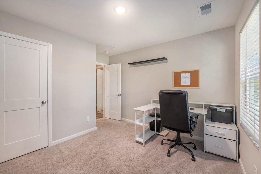 Furnished interior view inside a new home in , North Charleston (Image 14).