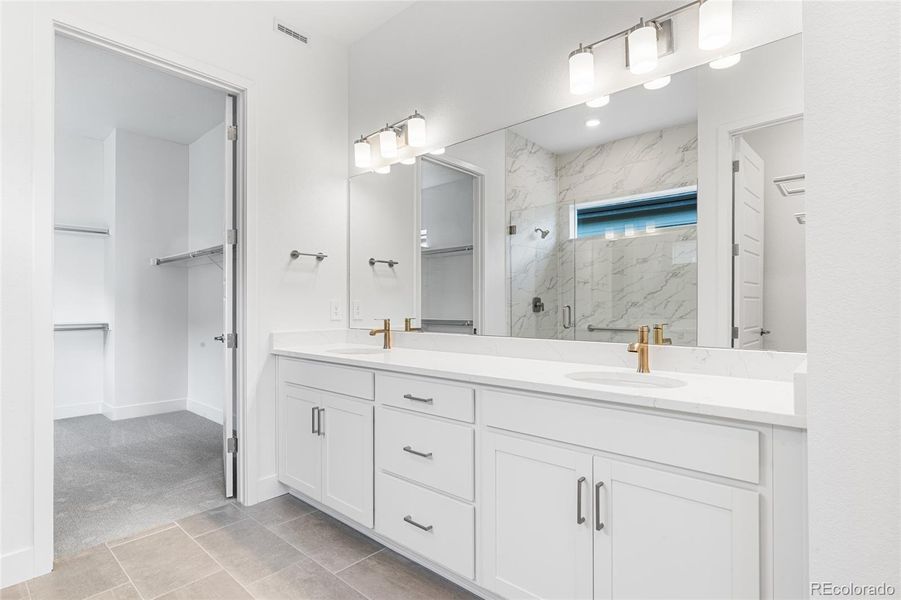 Furnished interior view inside a new home in Hilltop at Inspiration, Aurora (Image 11).