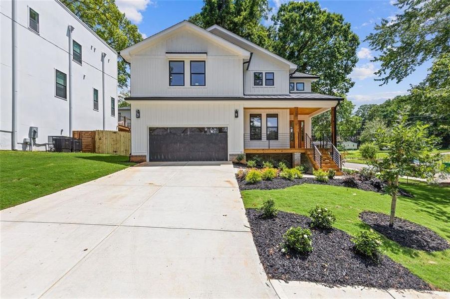 Front exterior of a new home in , Scottdale, GA, highlighting curb appeal (Image 32). Front exterior of a new home in , Scottdale, GA, highlighting curb appeal (Image 32).
