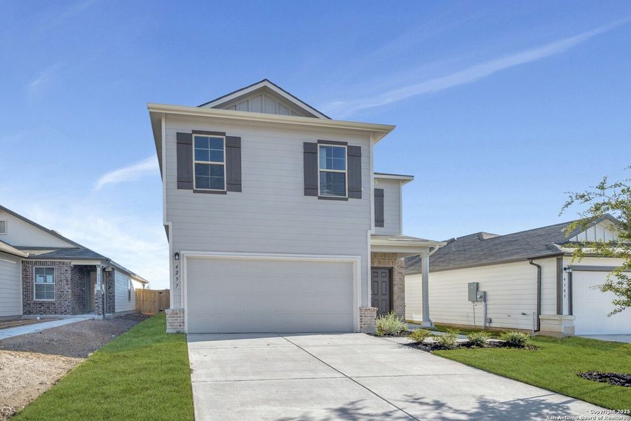 Front exterior of a new home in Park Place, New Braunfels, TX, highlighting curb appeal (Image 19).