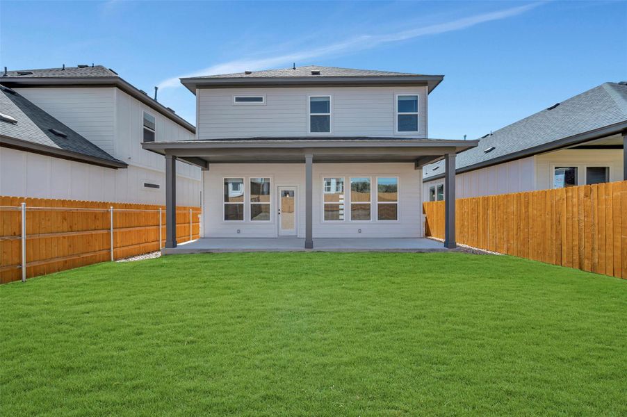 Exterior details and patio area of a home in Heritage, Dripping Springs (Image 24).