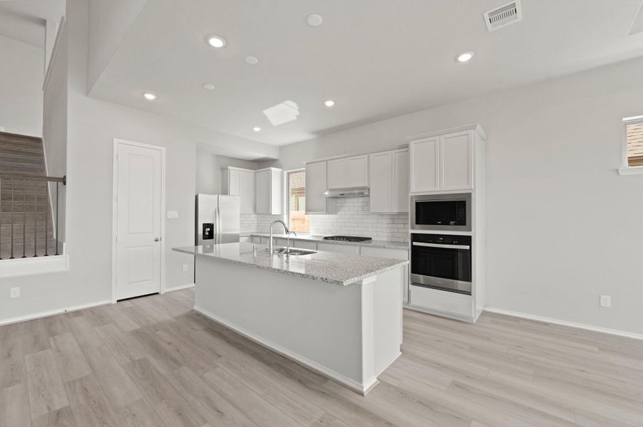 Furnished interior view inside a new home in The Trails, New Caney (Image 11). Furnished interior view inside a new home in The Trails, New Caney (Image 11).