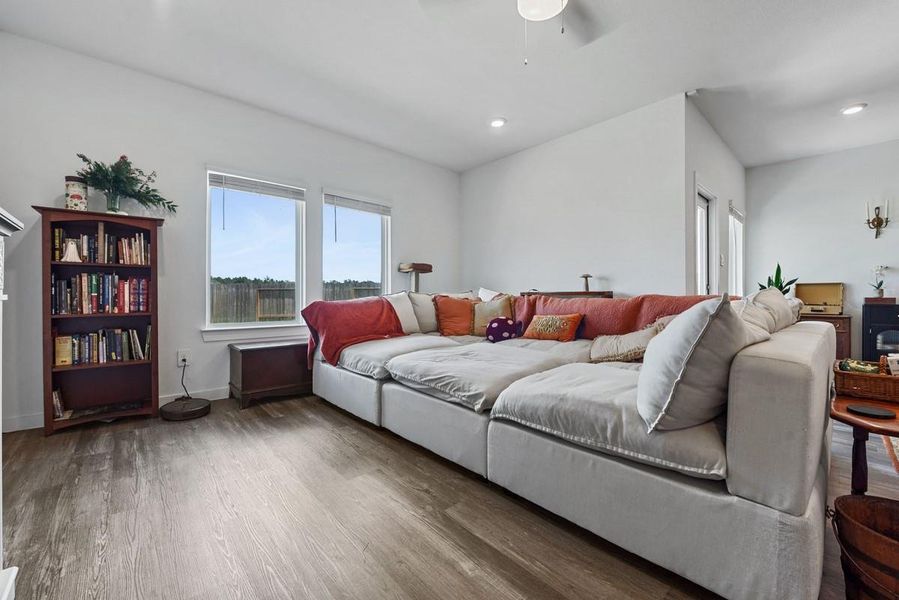 The living space is large enough to accommodate plenty of seating options and large furniture!