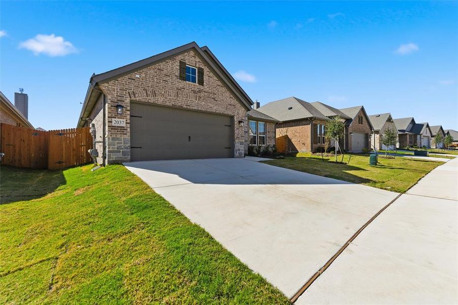 Front exterior of a new home in Northstar, Haslet, TX, highlighting curb appeal (Image 23).
