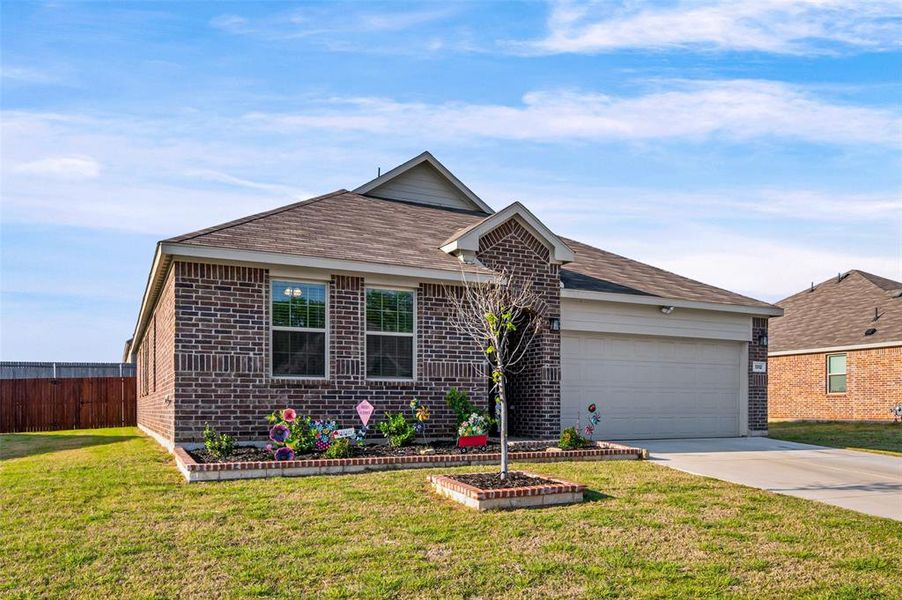 Front exterior of a new home in Azle Grove, Azle, TX, highlighting curb appeal (Image 24).