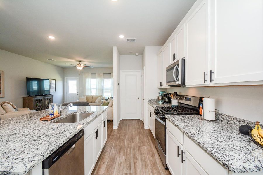 Furnished interior view inside a new home in Granger Pines, Conroe (Image 8).