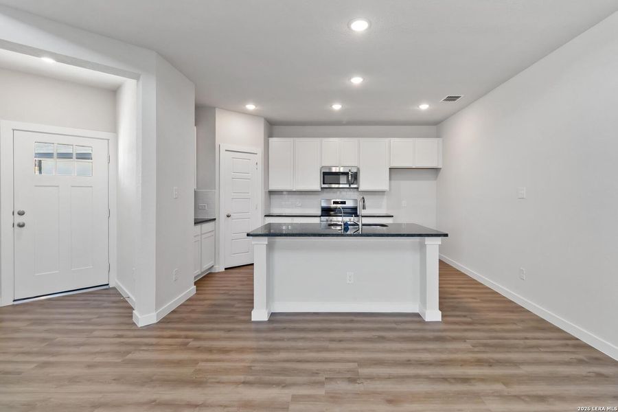 Furnished interior view inside a new home in Red Hawk Landing, San Antonio (Image 11).