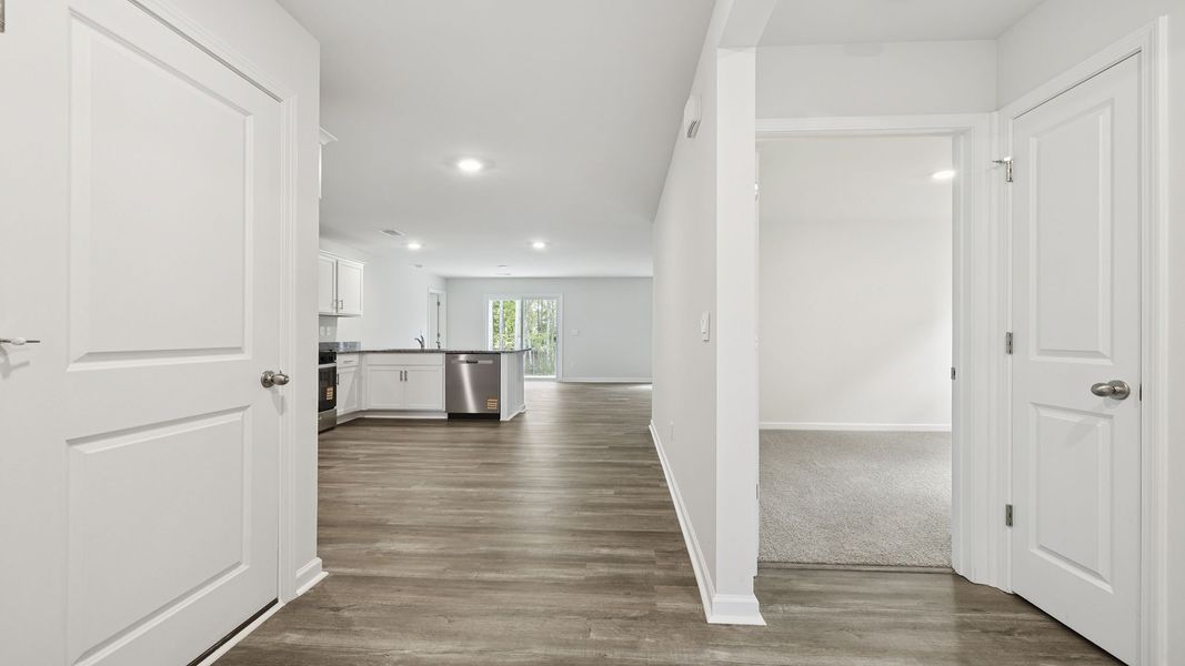 Spacious, unfurnished interior of a new home in Bentley Park, Greenwood (Image 11).