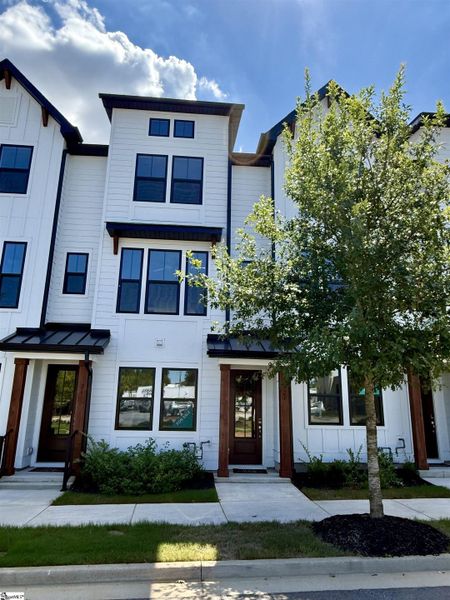 Front exterior of a new home in Renaissance Place, Greenville, SC, highlighting curb appeal (Image 17).
