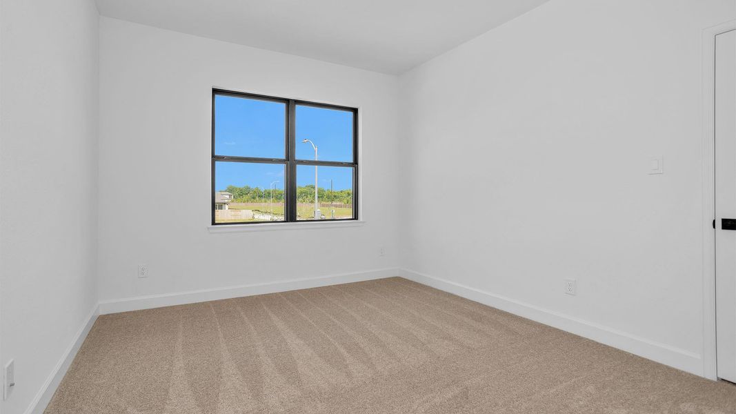 Spacious, unfurnished interior of a new home in Sienna, Missouri City (Image 7).