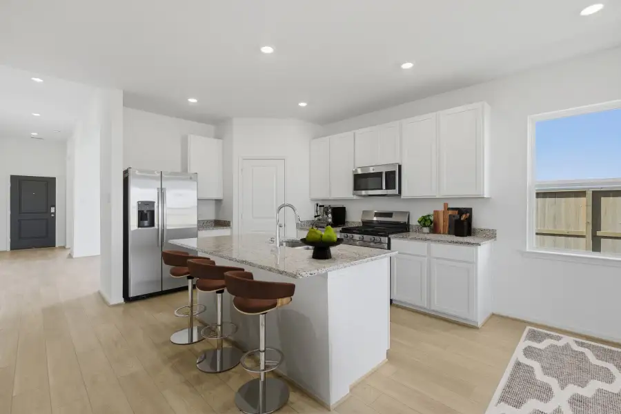 Furnished interior view inside a new home in Mason Woods, Cypress (Image 6).