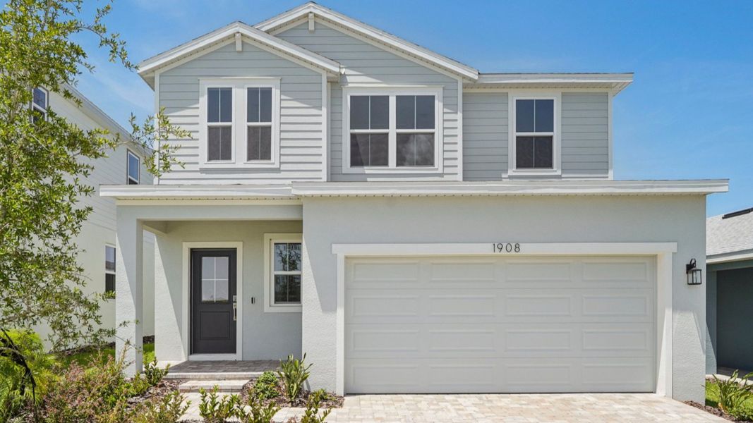 Representative exterior photo of a completed home built from the Jupiter by DRB Homes in Willowbrook North, Winter Haven, FL (Image 22).