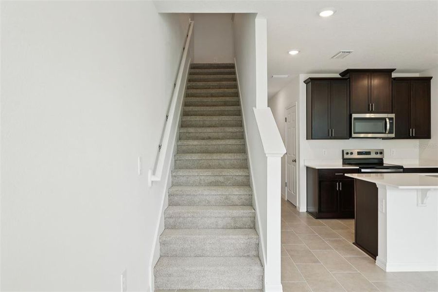 Furnished interior view inside a new home in Cagan Crossings West, Clermont (Image 9).