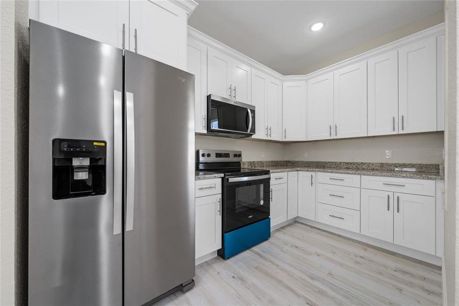 Furnished interior view inside a new home in , Kissimmee (Image 5).