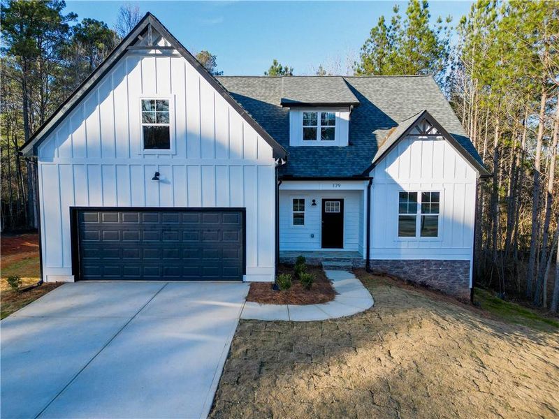 Front exterior of a new home in , Villa Rica, GA, highlighting curb appeal (Image 17).