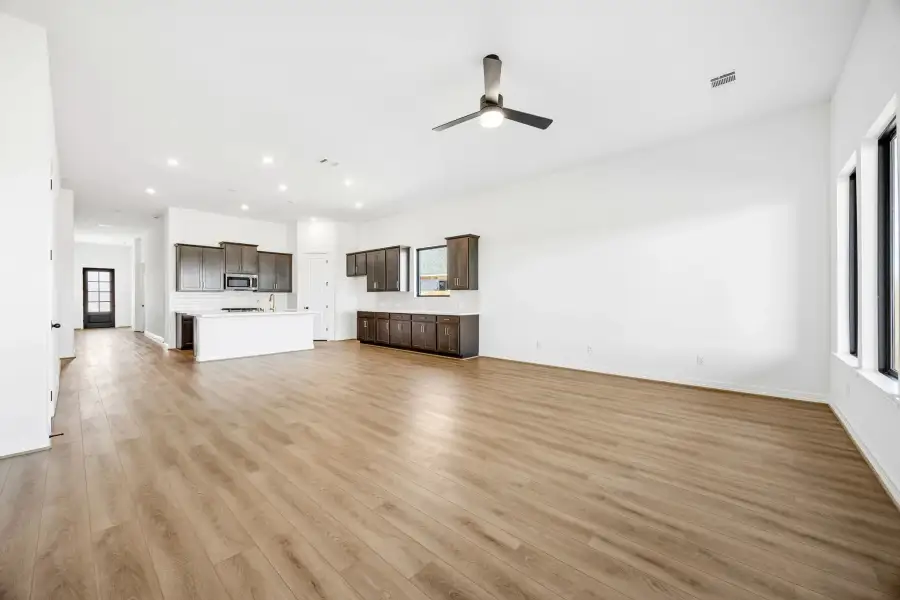 Gathering room. Sample product photo. Actual exterior and interior selections may vary by homesite. Photo may be virtually staged.