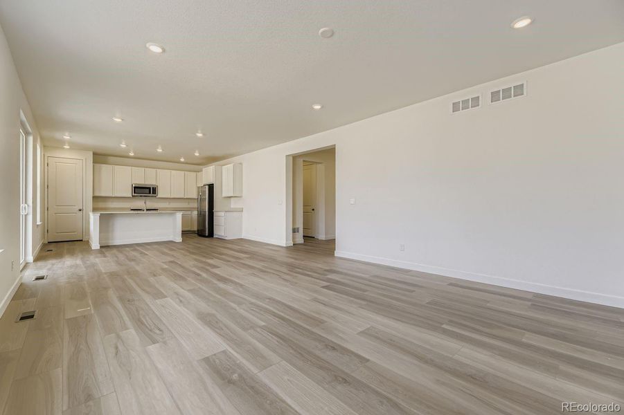 Spacious, unfurnished interior of a new home in Newlin Crossing: The Monarch Collection, Parker (Image 16).