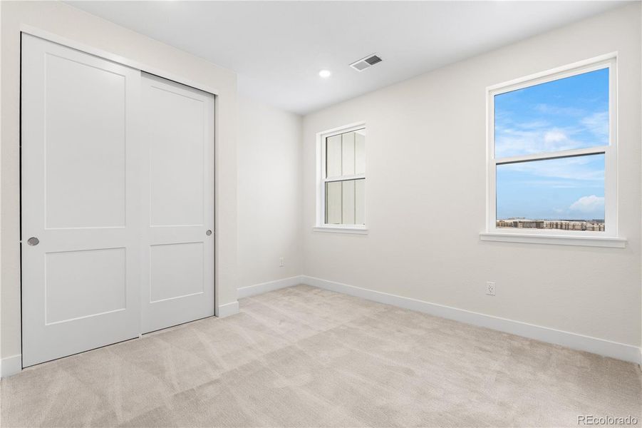 Spacious, unfurnished interior of a new home in Autograph at Lyric, Lone Tree (Image 46).