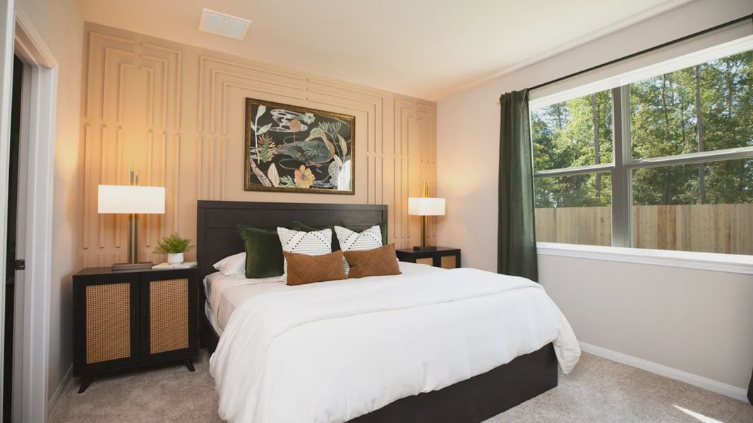 Representative furnished interior of a home built from the The Woodland by Legend Homes in Granger Pines, Conroe (Image 8).