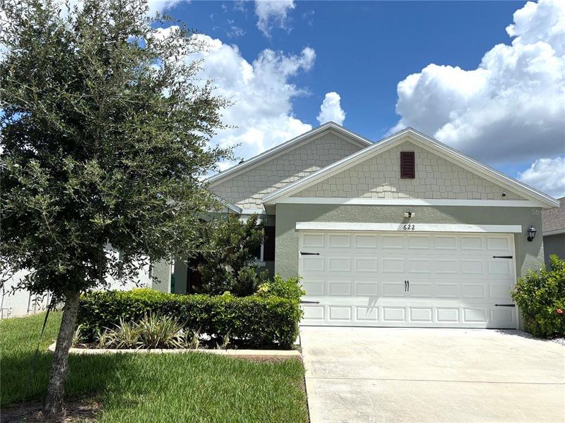 Front exterior of a new home in Victoria Oaks, Deland, FL, highlighting curb appeal (Image 23).