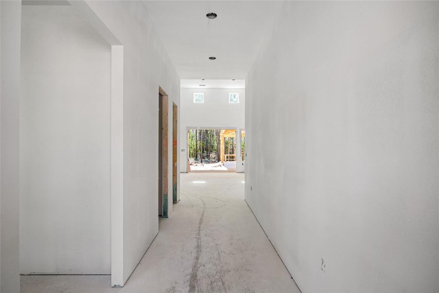 Front foyer with sight lines all the way through the back yard.