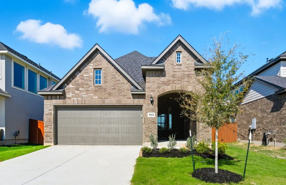 Front exterior of a new home in Stillwater Ranch, San Antonio, TX, highlighting curb appeal (Image 20). Front exterior of a new home in Stillwater Ranch, San Antonio, TX, highlighting curb appeal (Image 20).