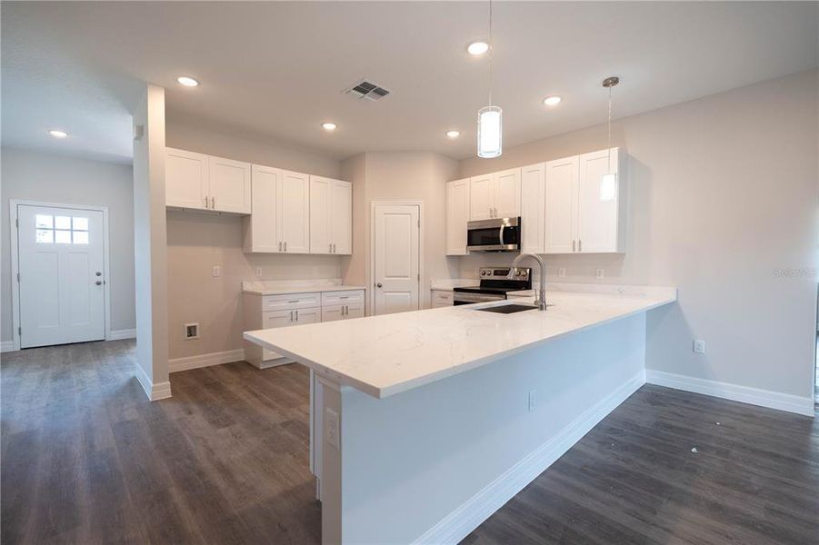 Furnished interior view inside a new home in , Tavares (Image 9).
