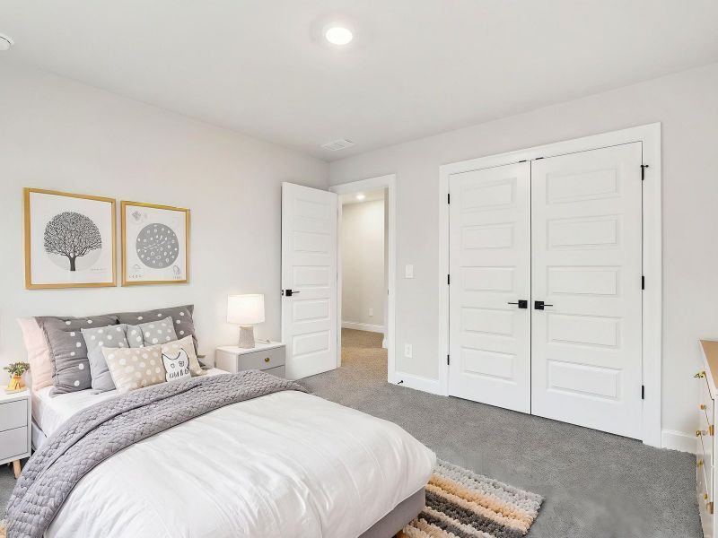 The Beaumont floorplan features four secondary bedrooms.