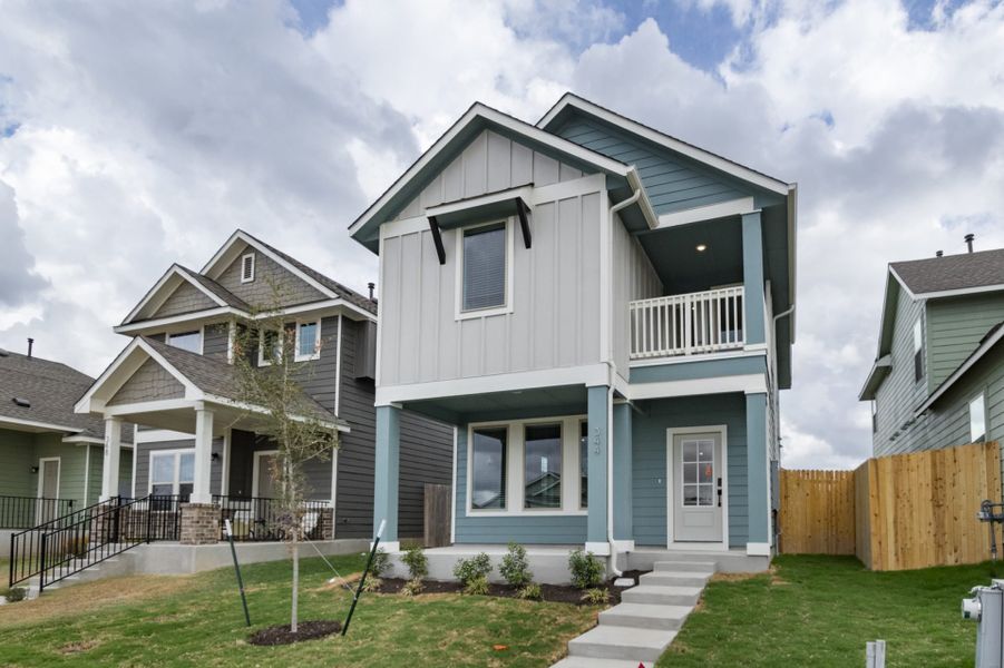Front exterior of a new home in Blanco Vista, San Marcos, TX, highlighting curb appeal (Image 17). Front exterior of a new home in Blanco Vista, San Marcos, TX, highlighting curb appeal (Image 17).