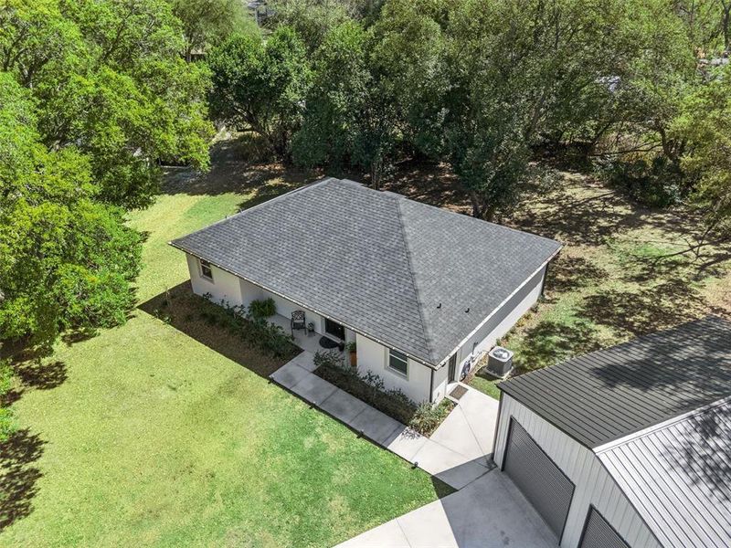 Front exterior of a new home in , Minneola, FL, highlighting curb appeal (Image 24).