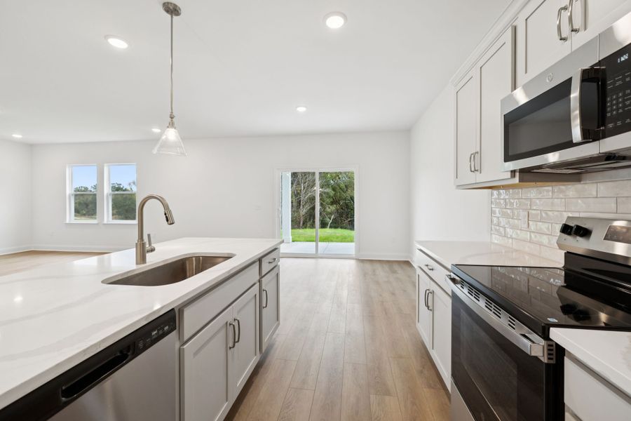 Representative furnished interior of a home built from the Montgomery by Ashton Woods in Cades Bluff, Lebanon (Image 6).