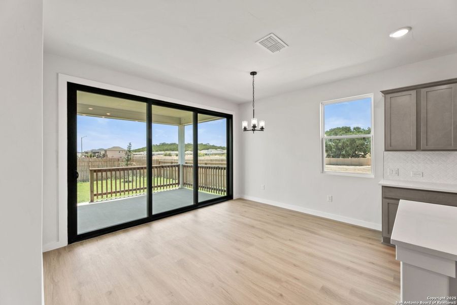 Spacious, unfurnished interior of a new home in Hunter's Ranch, San Antonio (Image 10).