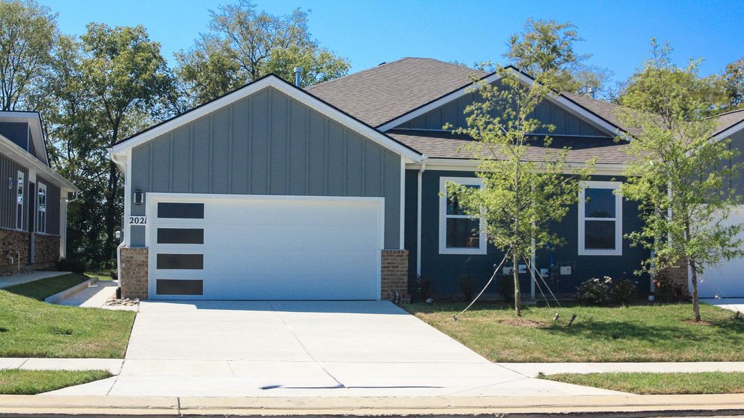 Front exterior of a new home in Nexus South, Gallatin, TN, highlighting curb appeal (Image 23). Front exterior of a new home in Nexus South, Gallatin, TN, highlighting curb appeal (Image 23).