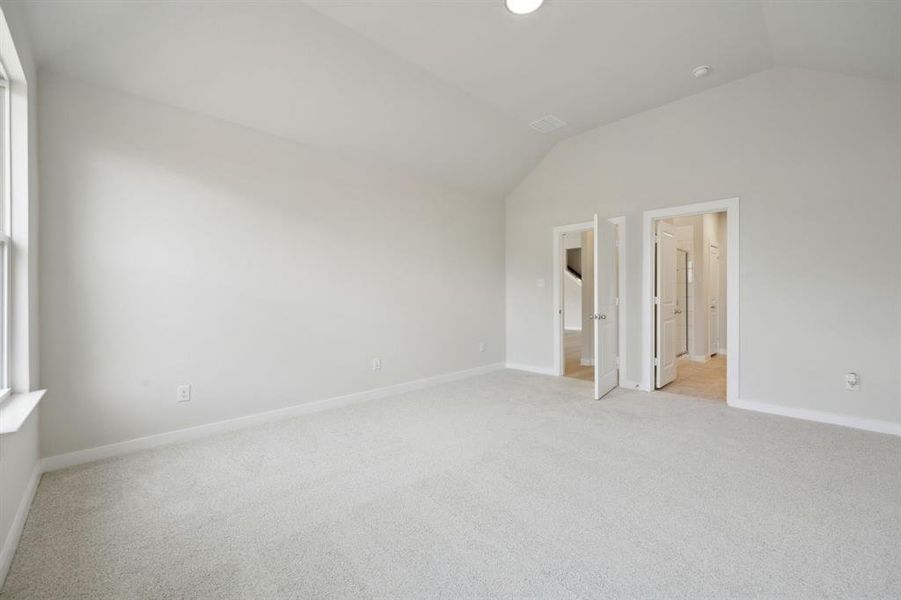 Here you can see the ensuite bathroom and door to the rest of the home