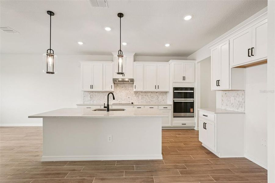 Furnished interior view inside a new home in Oakfield Trails - Signature Series, Parrish (Image 16).