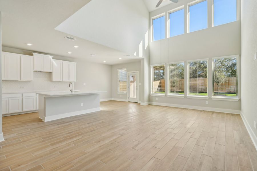 Living room in the Cedar floorplan at a Meritage Homes community.