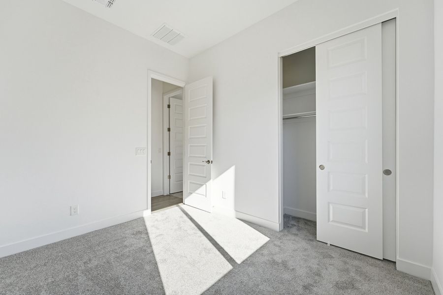 Spacious, unfurnished interior of a new home in Combs Ranch, San Tan Valley (Image 29).