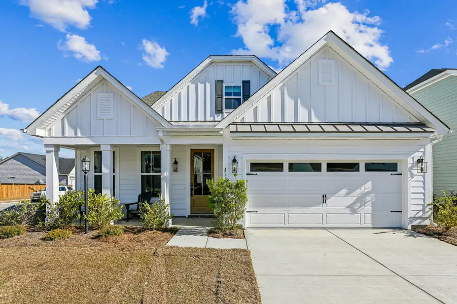 Front exterior of a new home in , Moncks Corner, SC, highlighting curb appeal (Image 1). Front exterior of a new home in , Moncks Corner, SC, highlighting curb appeal (Image 1).