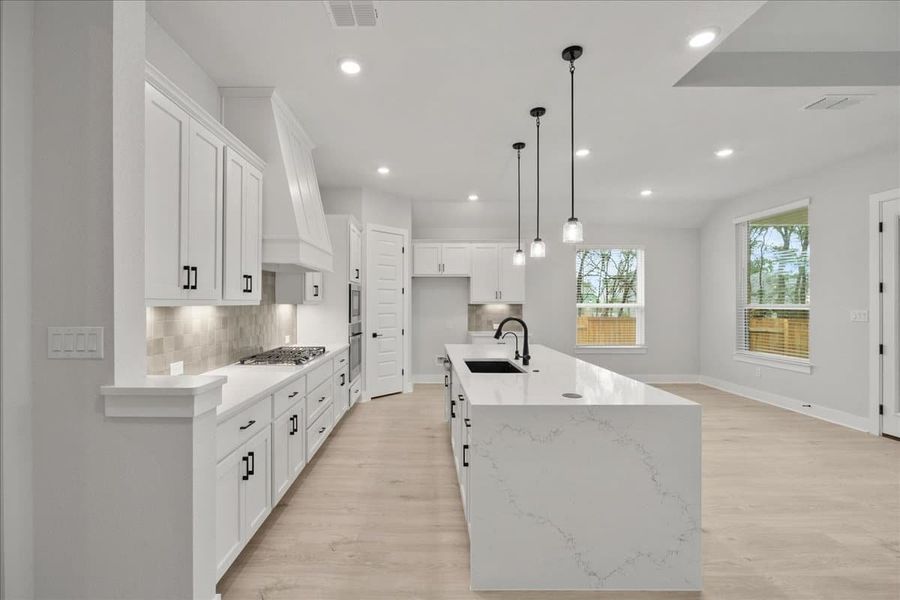 Furnished interior view inside a new home in 6 Creeks, Kyle (Image 11). Furnished interior view inside a new home in 6 Creeks, Kyle (Image 11).