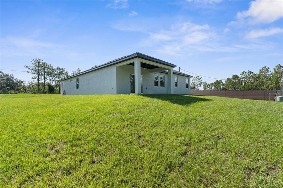 Exterior details and patio area of a home in , Weeki Wachee (Image 30).