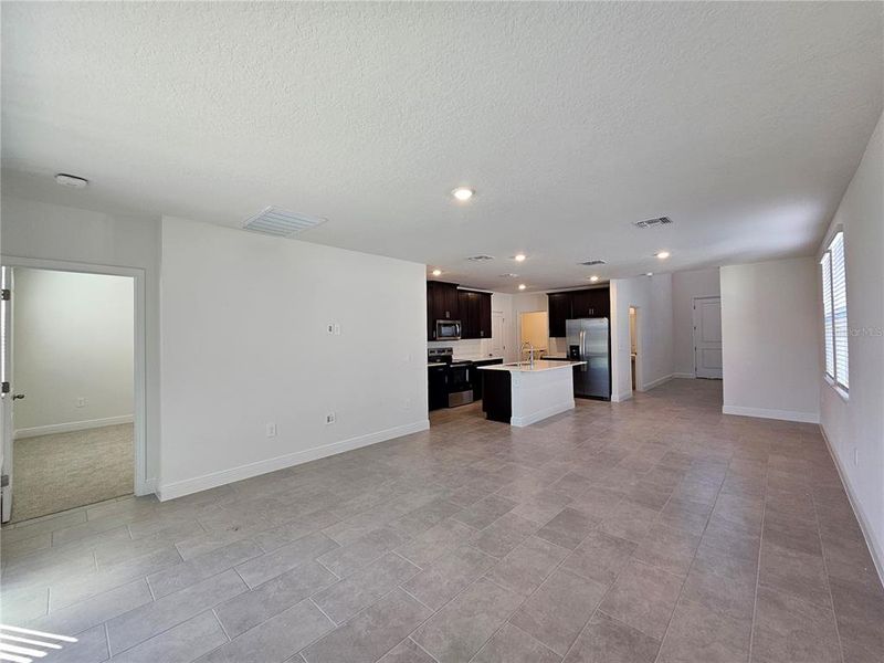 Spacious, unfurnished interior of a new home in The Reserve at Hammock Oaks - Classic Series, Lady Lake (Image 23).