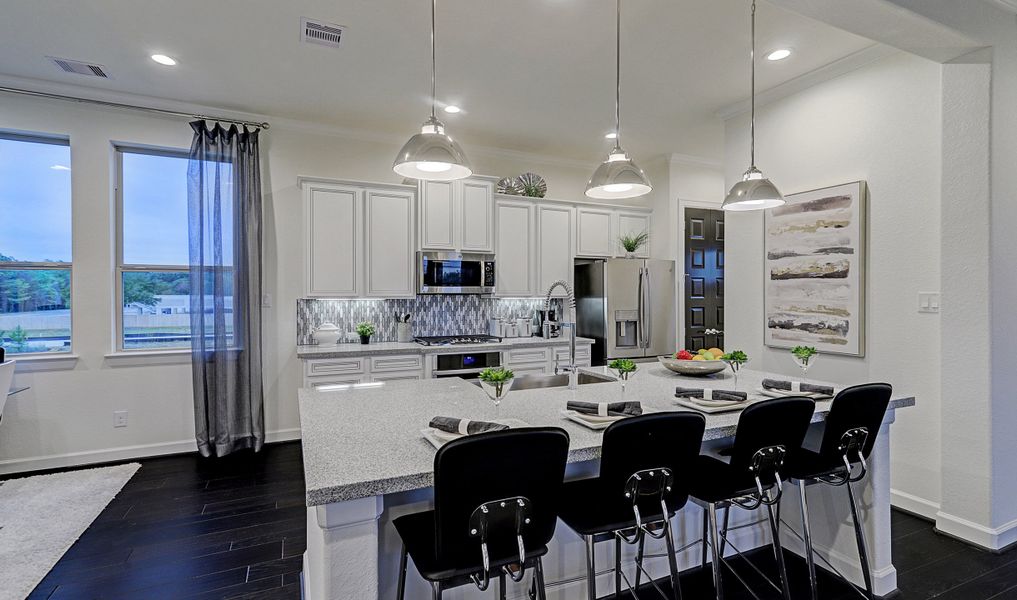 Pendant lights above kitchen island