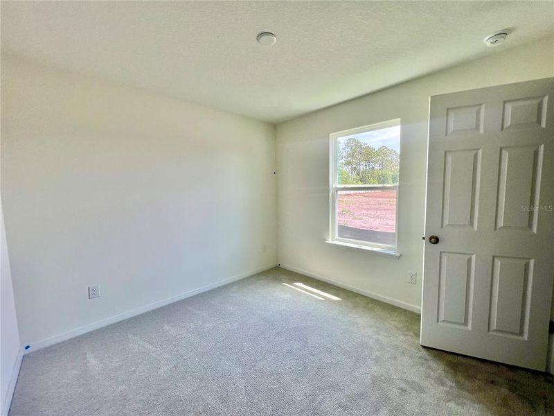 Spacious, unfurnished interior of a new home in Whiteview Village, Palm Coast (Image 9).