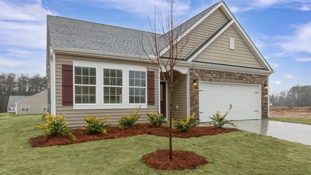 Front exterior of a new home in Colly Farm, Stokesdale, NC, highlighting curb appeal (Image 2).