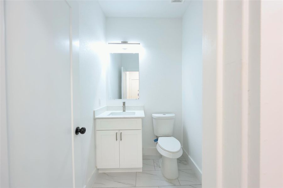 Powder room on main floor.