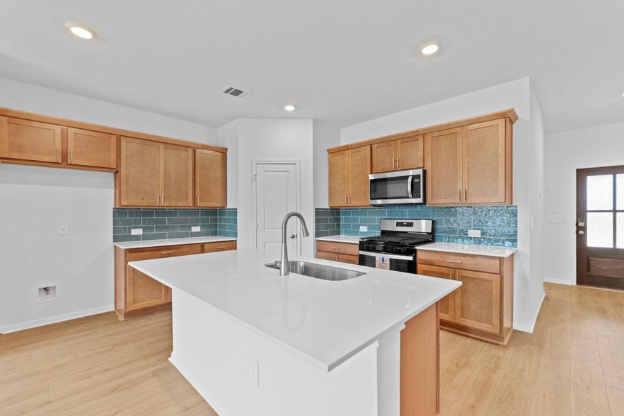 Furnished interior view inside a new home in Bar W Ranch, Leander (Image 10).