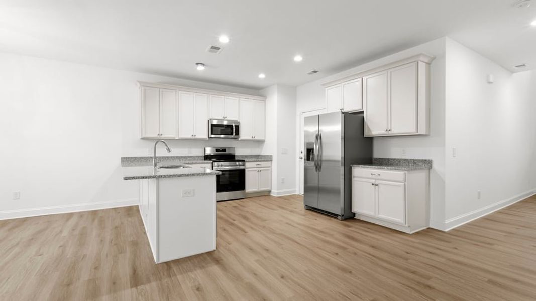 Representative furnished interior of a home built from the Interior Unit by D.R. Horton in Pearson Road Townhomes, Easley (Image 5).